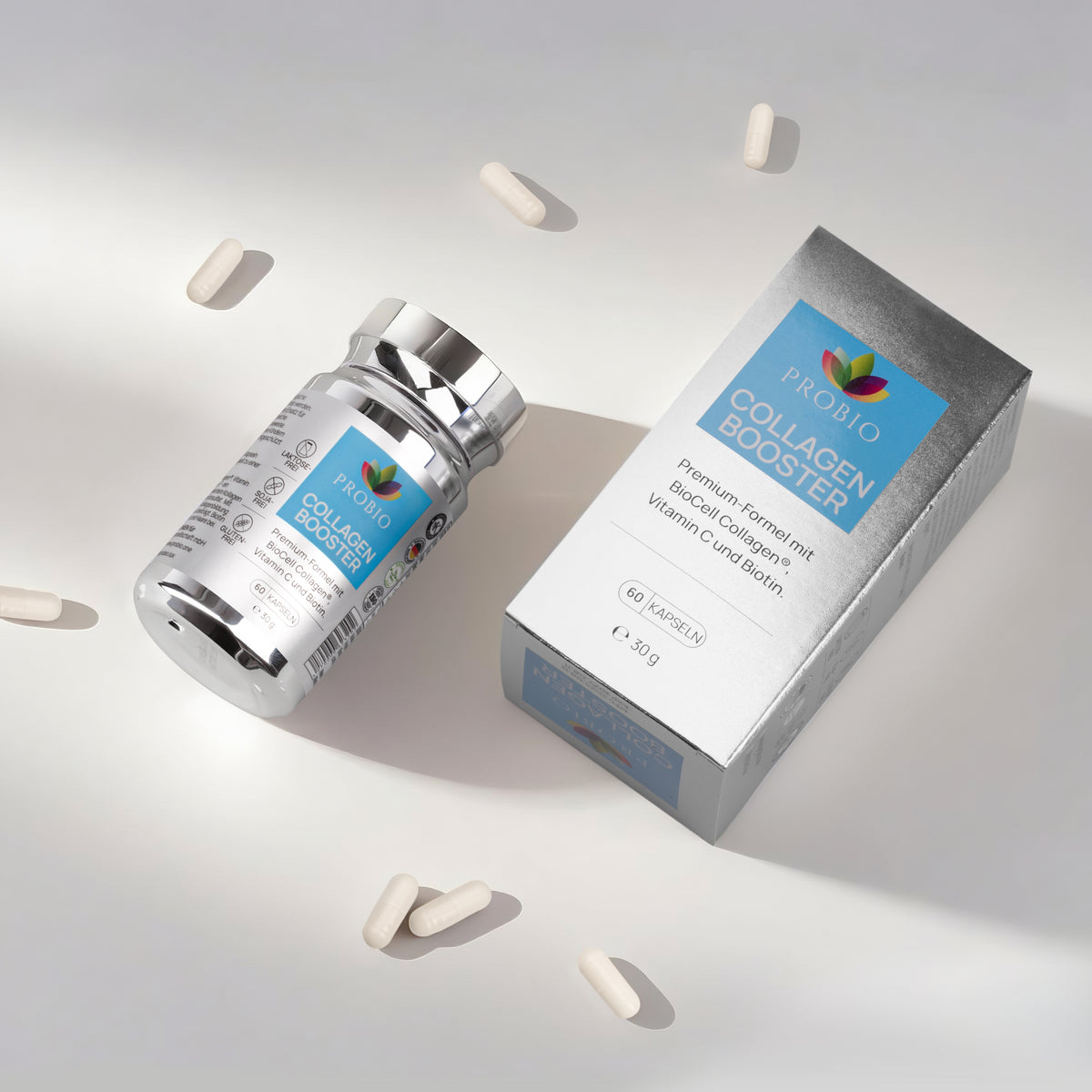 Probio Collagen Booster Produktfoto – Kapseln, Flasche und Verpackung im eleganten Flatlay mit Lichteffekten